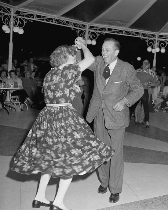 1958 Walt Disney enjoys a dance at Carnation Plaza